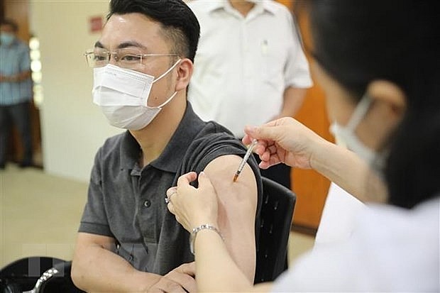 Covid-19 vaccination. Photo: VNA