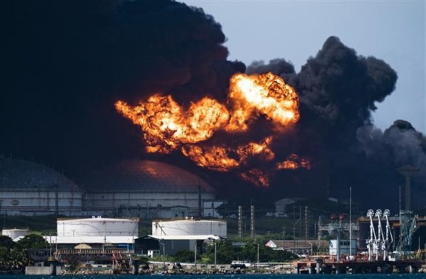 A view of the massive fire at the fuel depot, sparked overnight by a lightning strike in Matanzas in western Cuba. Photo: AFP