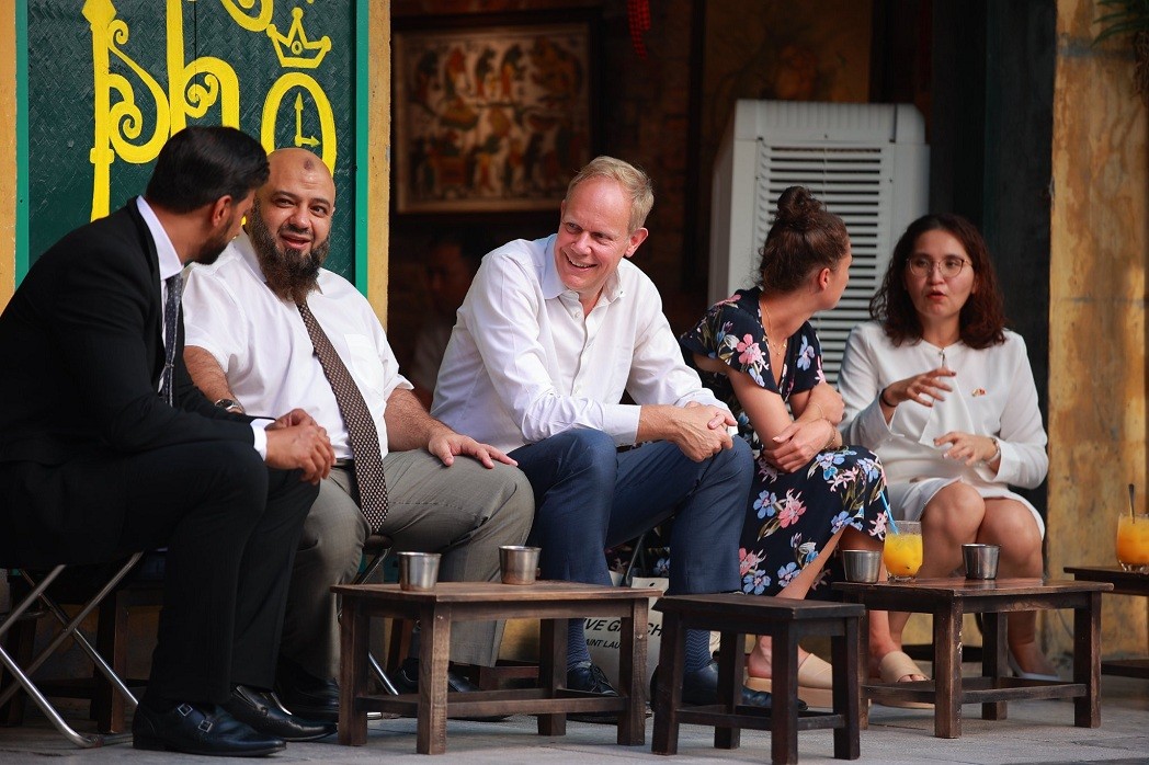 UK Home Office Permanent Under-Secretary Matthew Rycroft enjoyed a drink at a streetside cafe.
