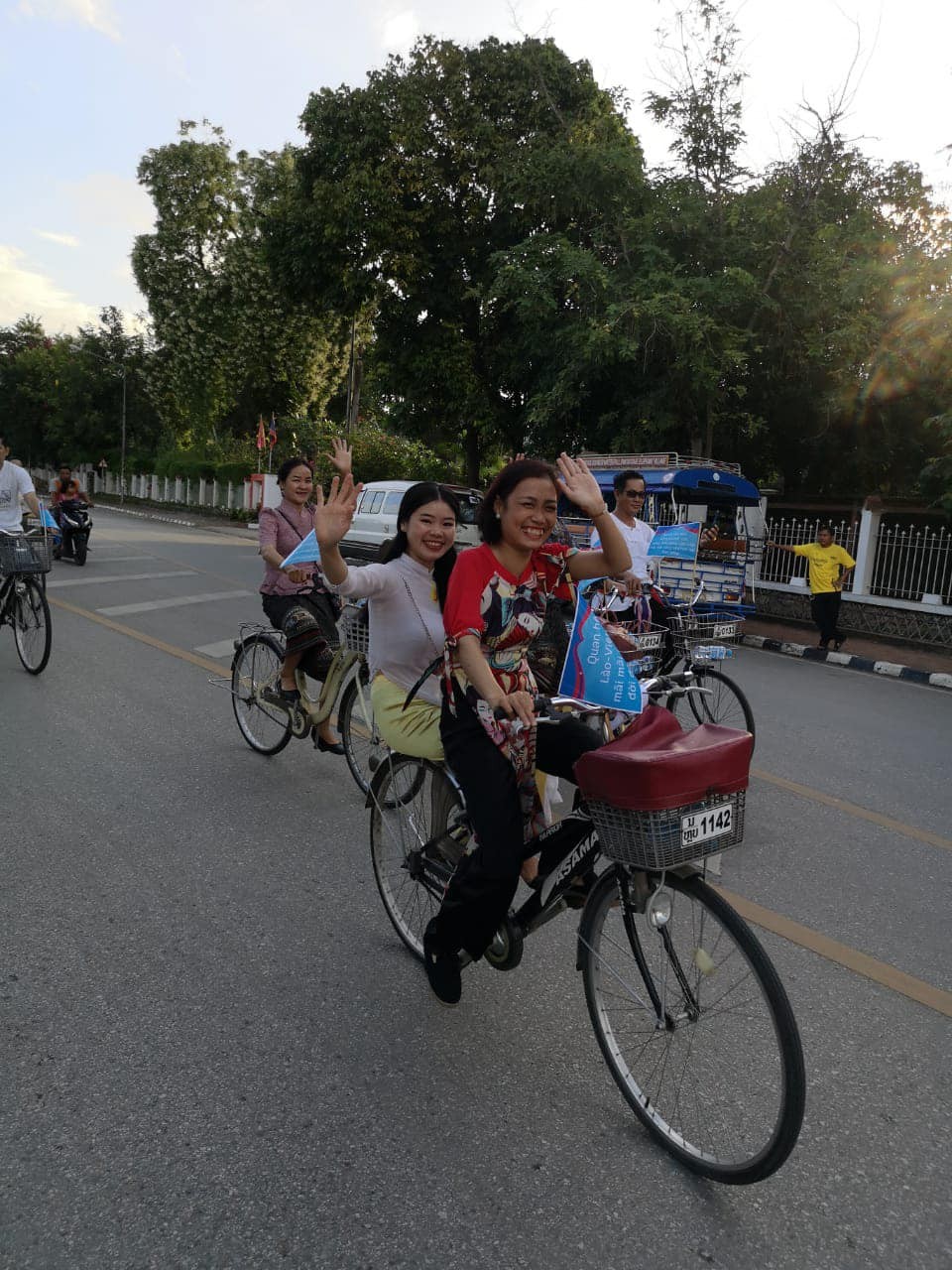 People of all ages divided into groups, excited to participate in the bicycle parade.