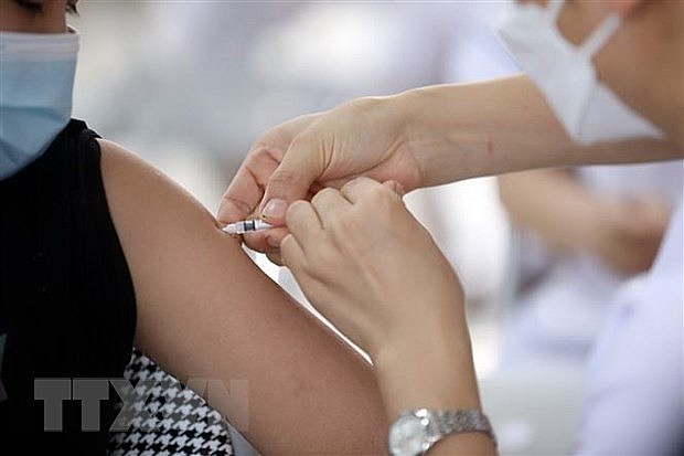 Covid-19 vaccination. Photo: VNA