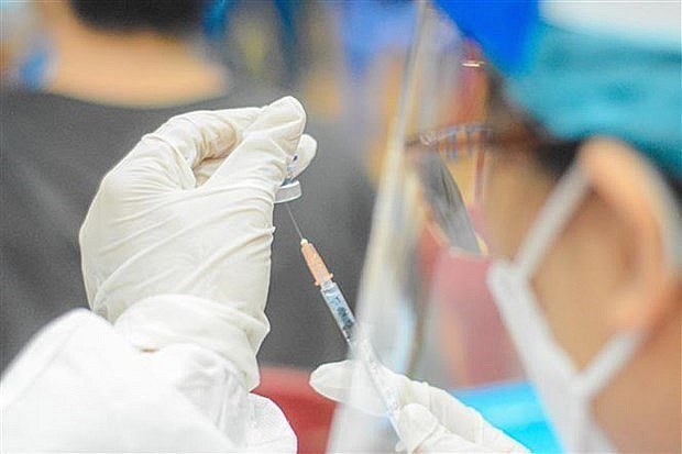 Covid-19 vaccination. Photo: VNA