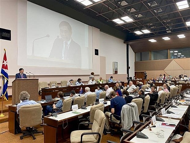 Vietnam attends 22nd International Meeting of Communist and Workers' Parties: Deputy head of Party Central Committee's Commission for Internal Affairs Tran Quoc Cuong speaks at the 22nd IMWCP. Photo: VNA