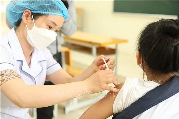 Covid-19 vaccination. Photo: VNA