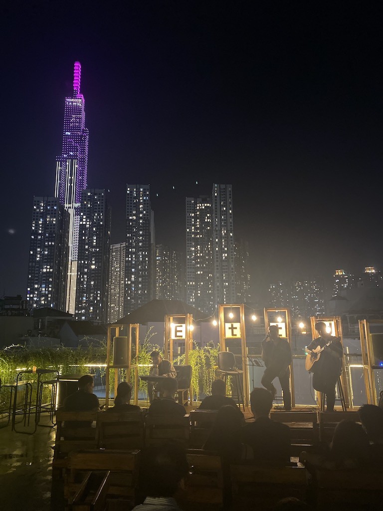 The band plays on the rooftop of District 3, Ho Chi Minh City, behind is the city's Landmark 81 symbol ( taken by Nhung Nguyen). The band plays on the rooftop of District 3, Ho Chi Minh City, behind is the city's Landmark 81 symbol ( taken by Nhung Nguyen).