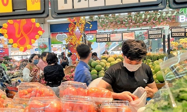 Customers shop at a Co.opmart supermarket in HCM City. Photo courtesy of Saigon Co.op