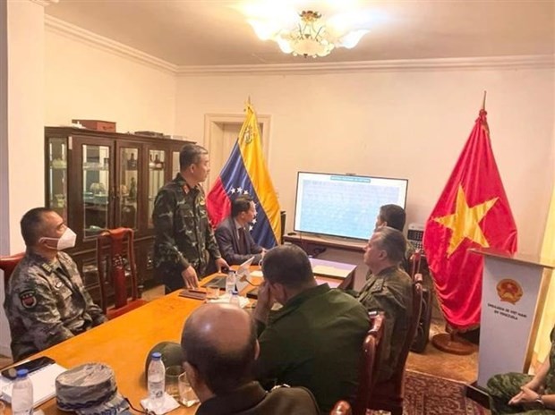 Defence Attaché Col. Vu The Trung introduces Vietnam's National Defence White Paper. Photo: VNA