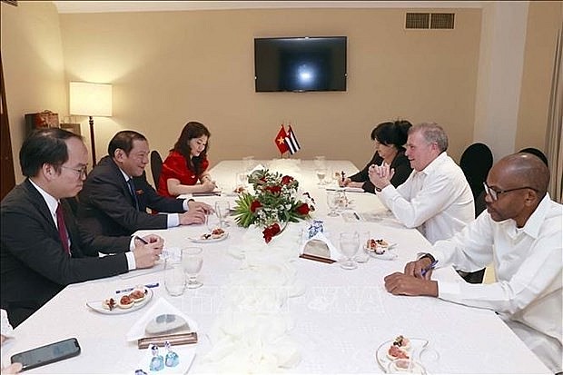 At the talks between Minister of Culture, Sports and Tourism Nguyen Van Hung and Minister of Tourism Juan Carlos García Granda (Photo: VNA) 