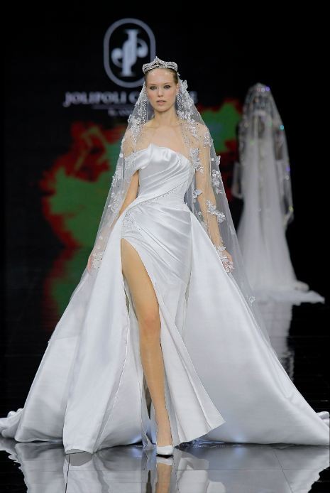 The local designer uses a draping technique and 3D flower sculpting on silk and chiffon to create outfits.