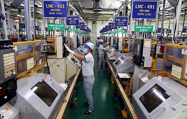 More and more multinationals and big investors have continuously invested in Vietnam. - Illustrative image (Photo: VNA)