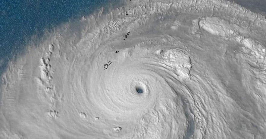 The eye of a powerful storm forming in the ocean.