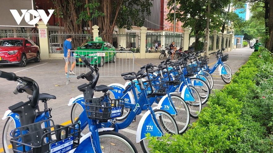 At a public bicycle sharing point on Dao Tan street.