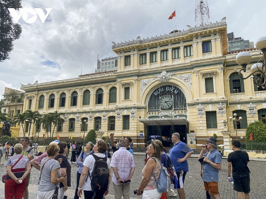 International tourists visit Saigon Central Post Office in Ho Chi Minh City 