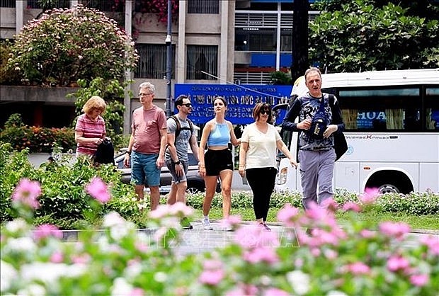 Foreign tourists visit Ho Chi Minh City. (Photo: VNA)