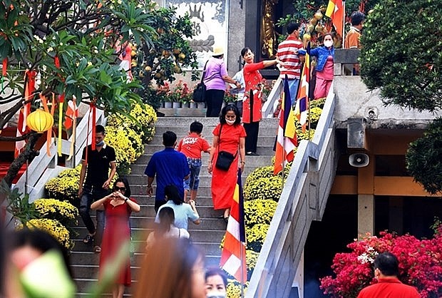 People go to Vinh Nghiem pagoda in Ho Chi Minh City.
