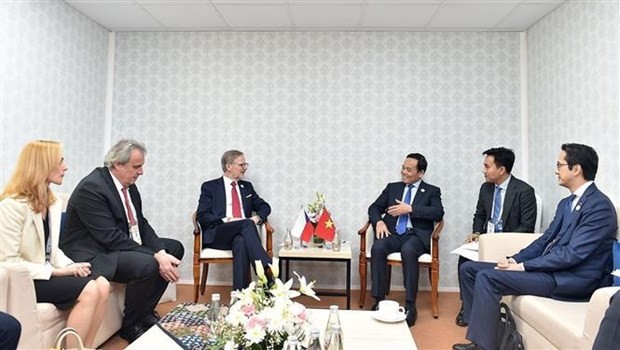 Vietnamese Deputy Prime Minister Tran Luu Quang and Czech Prime Minister Petr Fiala. Photo: VNA