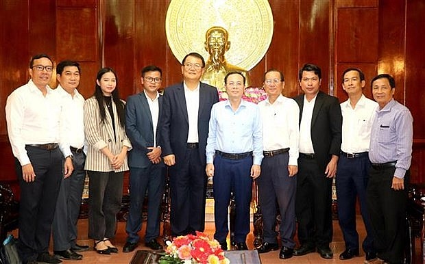 Representatives of Can Tho city and SK Group at the meeting. (Photo: VNA)