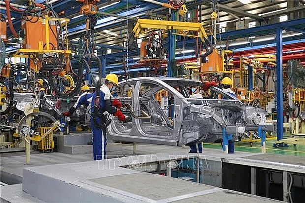 At Huyndai Thanh Cong auto assembly factory (Photo: VNA)