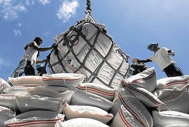 Importing Vietnamese rice at Surigao port: Photo: Inquirer