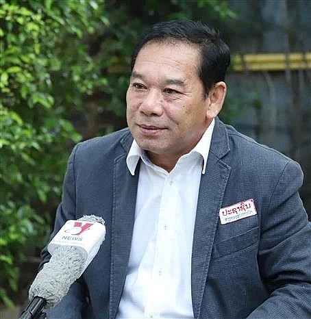 Vanxay Tavinyan, Vice Chairman of the LPRP Central Committee’s Commission for Propaganda and Training and Editor-in-chief of the Pasaxon newspaper, grants an interview to the Vietnam News Agency. (Photo: VNA) Vanxay Tavinyan, Vice Chairman of the LPRP Central Committee’s Commission for Propaganda and Training and Editor-in-chief of the Pasaxon newspaper, grants an interview to the Vietnam News Agency. (Photo: VNA)