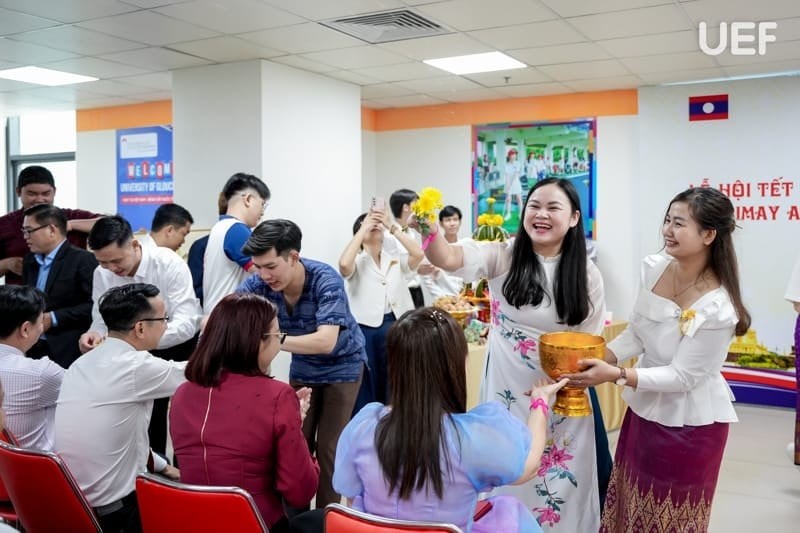 Lao and Cambodian students at the University of Economics and Finance in Ho Chi Minh City joyfully celebrate the traditional New Year. (Photo: UEF HCMC)