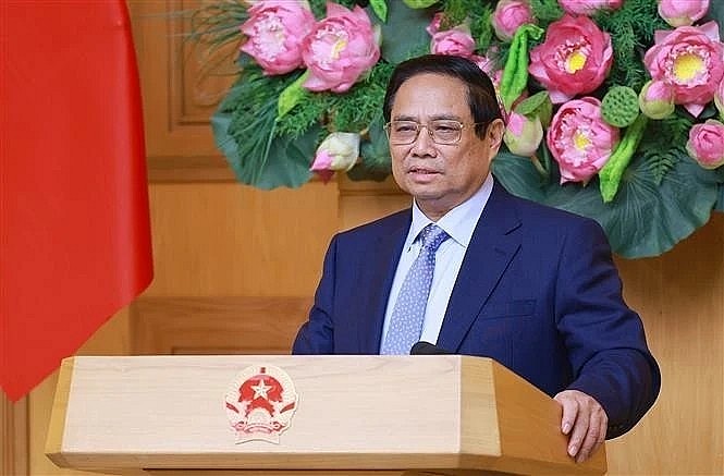 Prime Minister Pham Minh Chinh speaks at the dialogue with the US business community in Hanoi on May 13. (Photo: VNA)