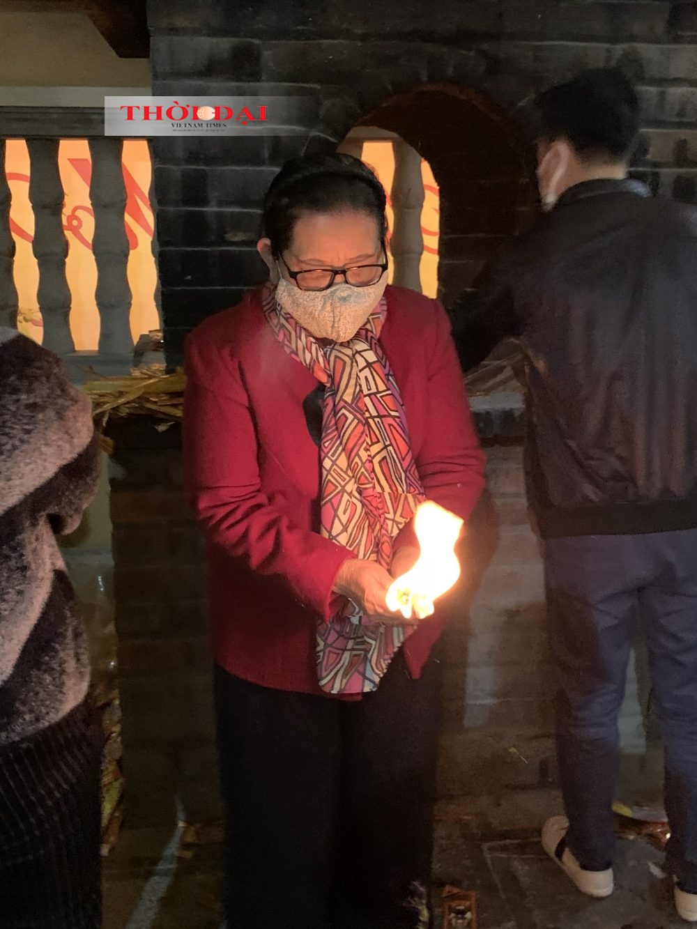 People follow Covid-19 safety protocol while visiting Quan Su pagoda