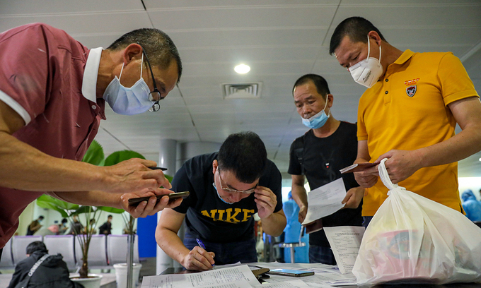 Two more detained for smuggling fake foreign experts into Vietnam