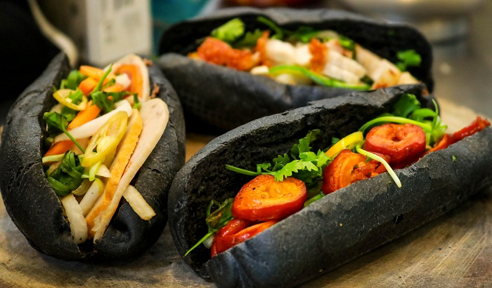 unique black colored dishes draw vietnamese youngsters favor