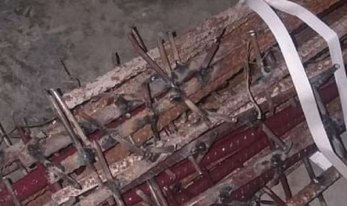 picture of nail studded iron rod in china inda clash is fake