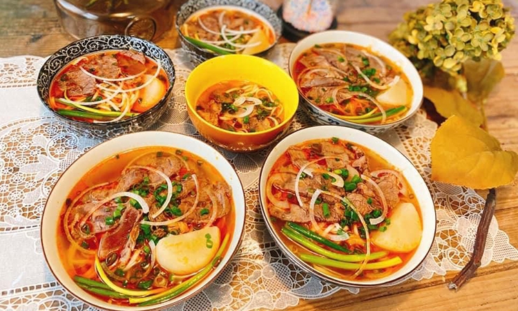 Homemade recipe for 'Bun Bo Hue' (Hue style beef noodle soup) with popular ingredients