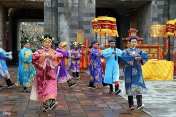 replication of new years calendar book distribution ceremony in hue