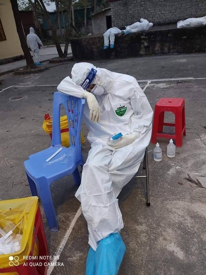Medics brave pouring rain to track coronavirus amist rising cases