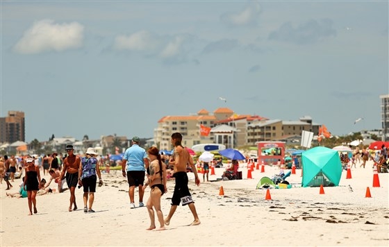 restrictive measures in place as us beaches reopen for memorial day amid covid 19 pandemic