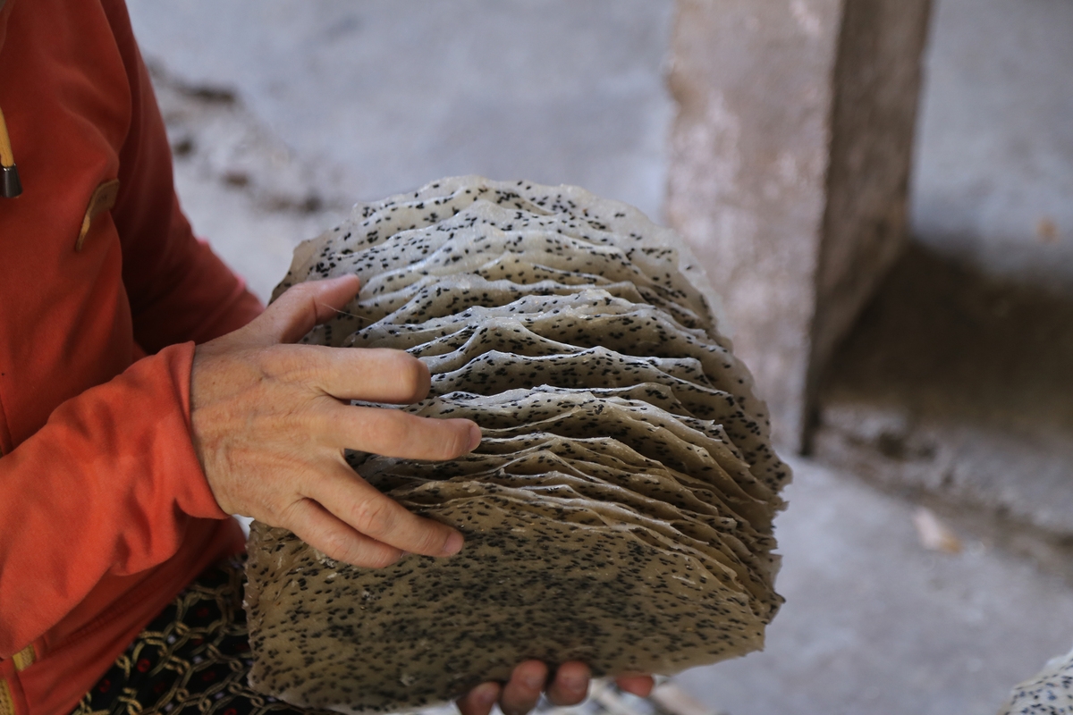 Rice paper making under burning sun in Central Vietnam