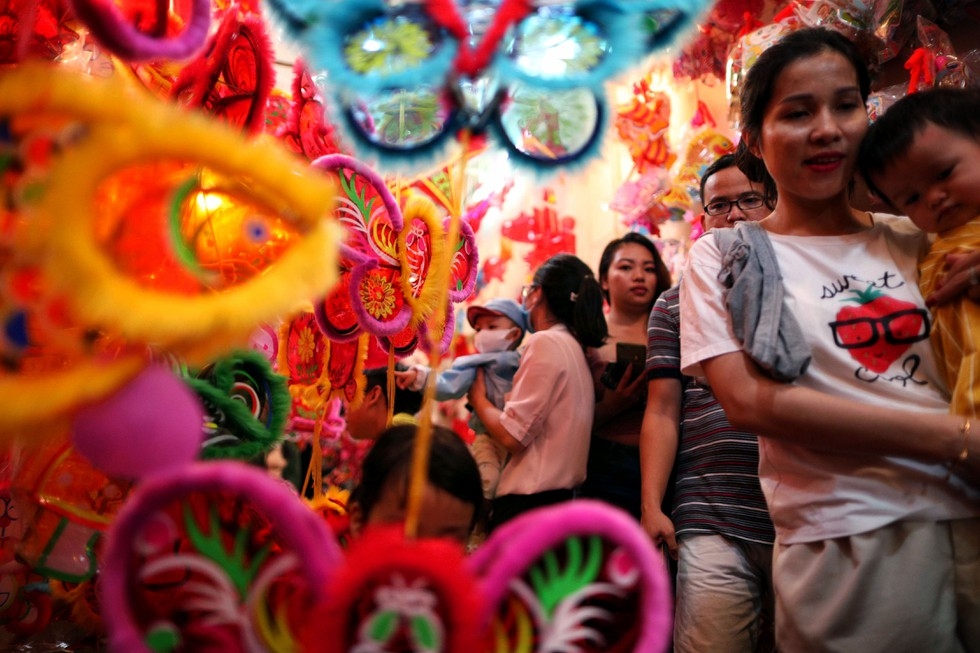 Lantern street in Saigon jam-packed with holiday goers