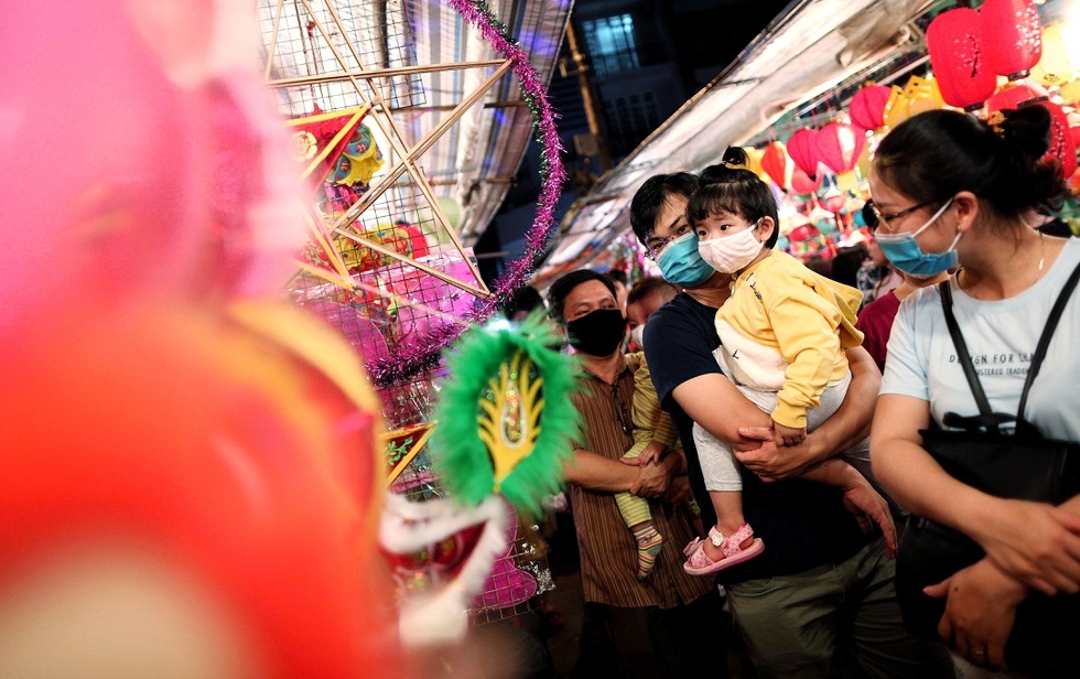 Lantern street in Saigon jam-packed with holiday goers