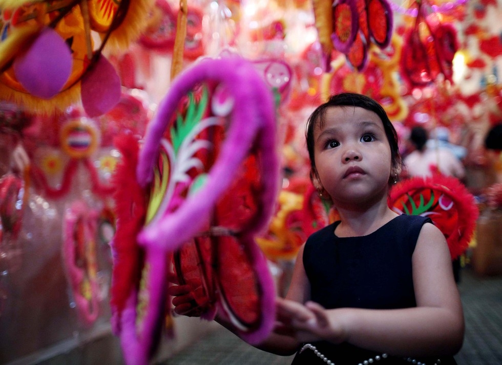 Lantern street in Saigon jam-packed with holiday goers