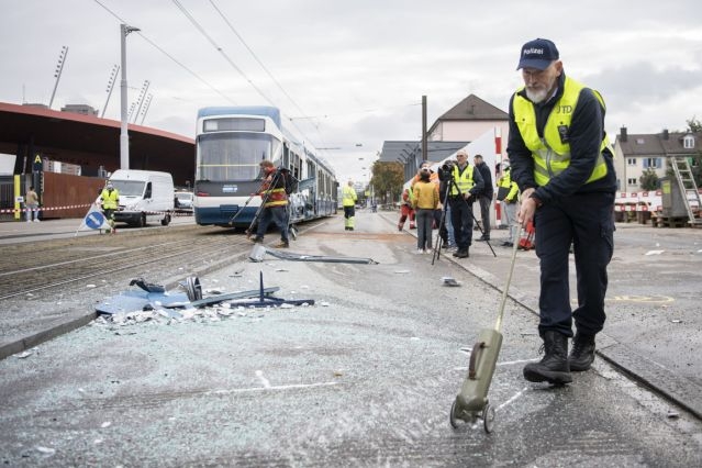 Fourteen people have been injured after a truck collided with a tram in the Swiss city of Zurich.