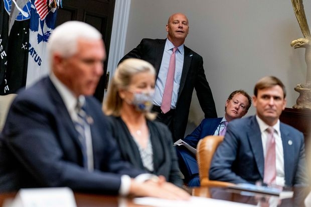 Vice President Mike Pence's chief of staff Marc Short, pictured center in September, has tested positive for Covid-19.