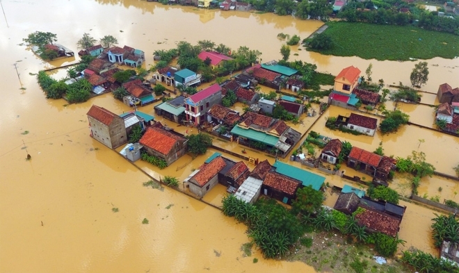 Houses in Central Vietnam inundated in floodwater (Photo: Luat Vietnam) 