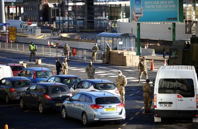 More than 4,500 lorries, among a huge backlog of trucks stranded for days in the British port of Dover, crossed the Channel on Friday after extra troops were deployed to step up coronavirus testing