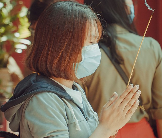 Why Vietnamese clasp hands and pray 