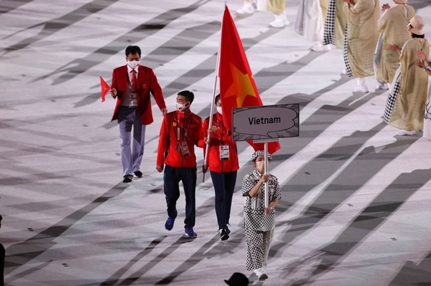 In Photo: Vietnamese Delegation Marches At Tokyo Olympics Opening Ceremony