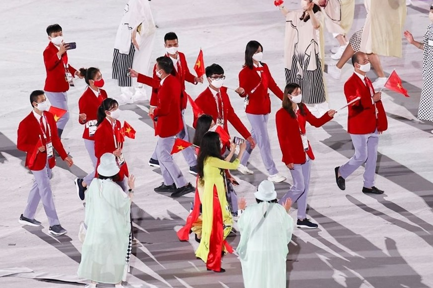 In Photo: Vietnamese Delegation Marches At Tokyo Olympics Opening Ceremony