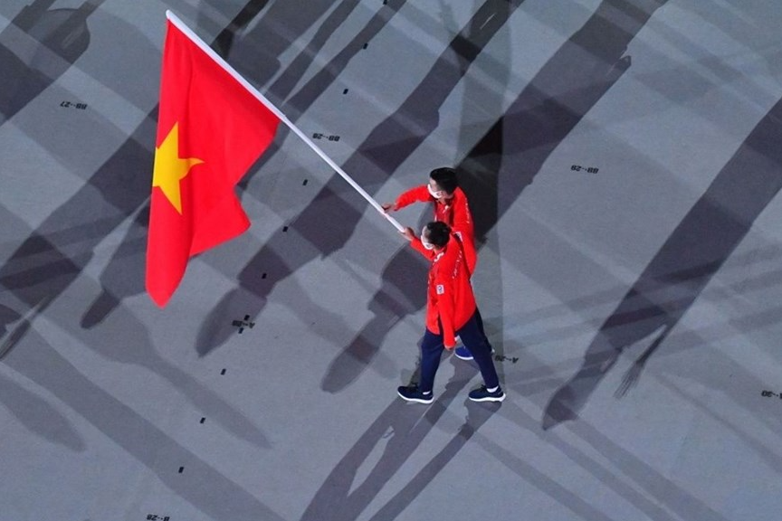In Photo: Vietnamese Delegation Marches At Tokyo Olympics Opening Ceremony