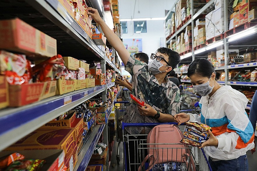 Saigon citizens at Mega Market in Thu Duc, shopping after social distancing