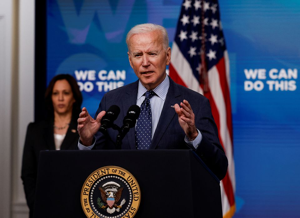 U.S. President Joe Biden delivers remarks on his administration's coronavirus disease (COVID-19) response, as Vice President Kamala Harris stands by in the Eisenhower Executive Office Building's South Court Auditorium at the White House in Washington, U.S., June 2, 2021. REUTERS/Carlos Barria