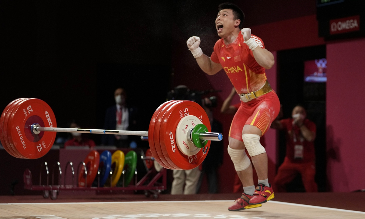 Chen Lijun celebrates after winning gold on Sunday in Tokyo, Japan. Photo: VCG