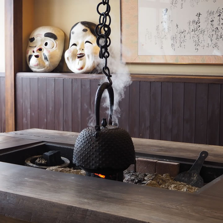 A fireplace at Kyounso Japanese Inn. The Onsen hot springs spa at Kyounso is available for both guests staying at the inn and visitors. Photo: Getty 